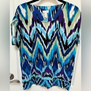 Chico’s multi colored top in size 2 (large).